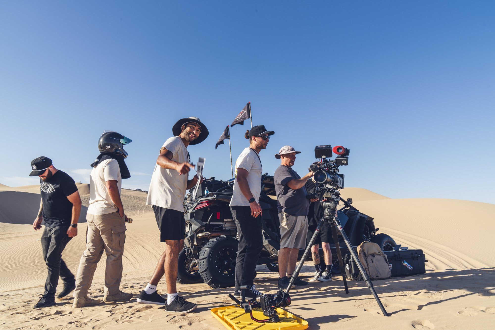 Behind the scenes: crew and camera rigs on the sand dunes