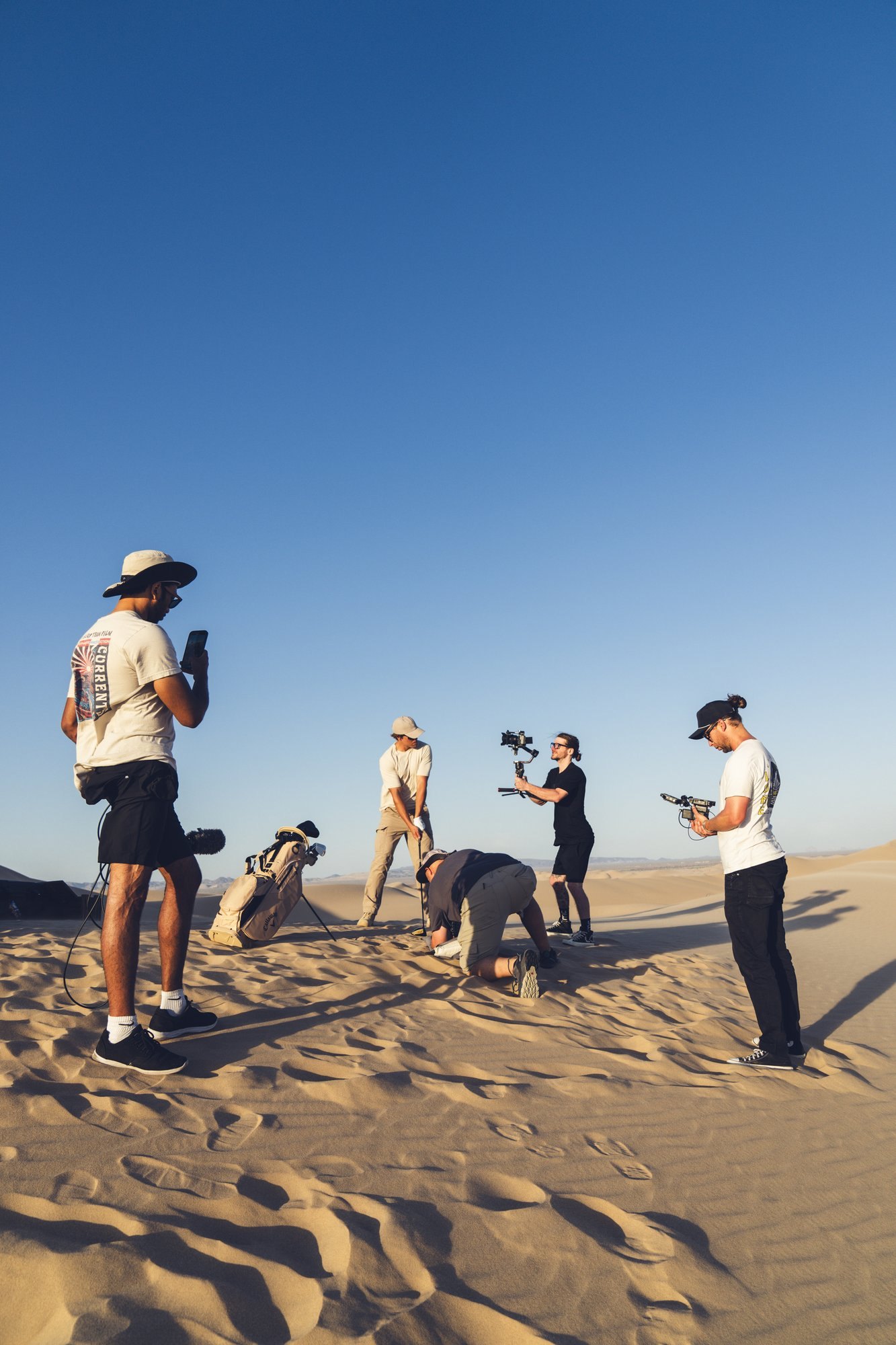 Behind the scenes: crew filming on the dunes